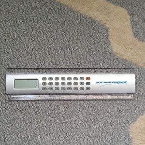 🗽 Northrop Grumman Silver Calculator Ruler